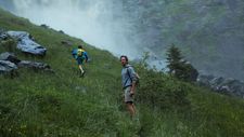 Elio and Oliver hike up to a waterfall in Call Me By Your Name